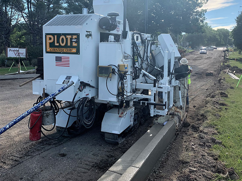 Plote Construction paves with M-1000